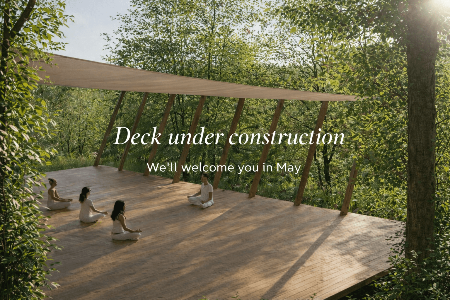 Outdoor yoga deck at dawn with meditation cushions and mats overlooking the Val d'Orcia landscape