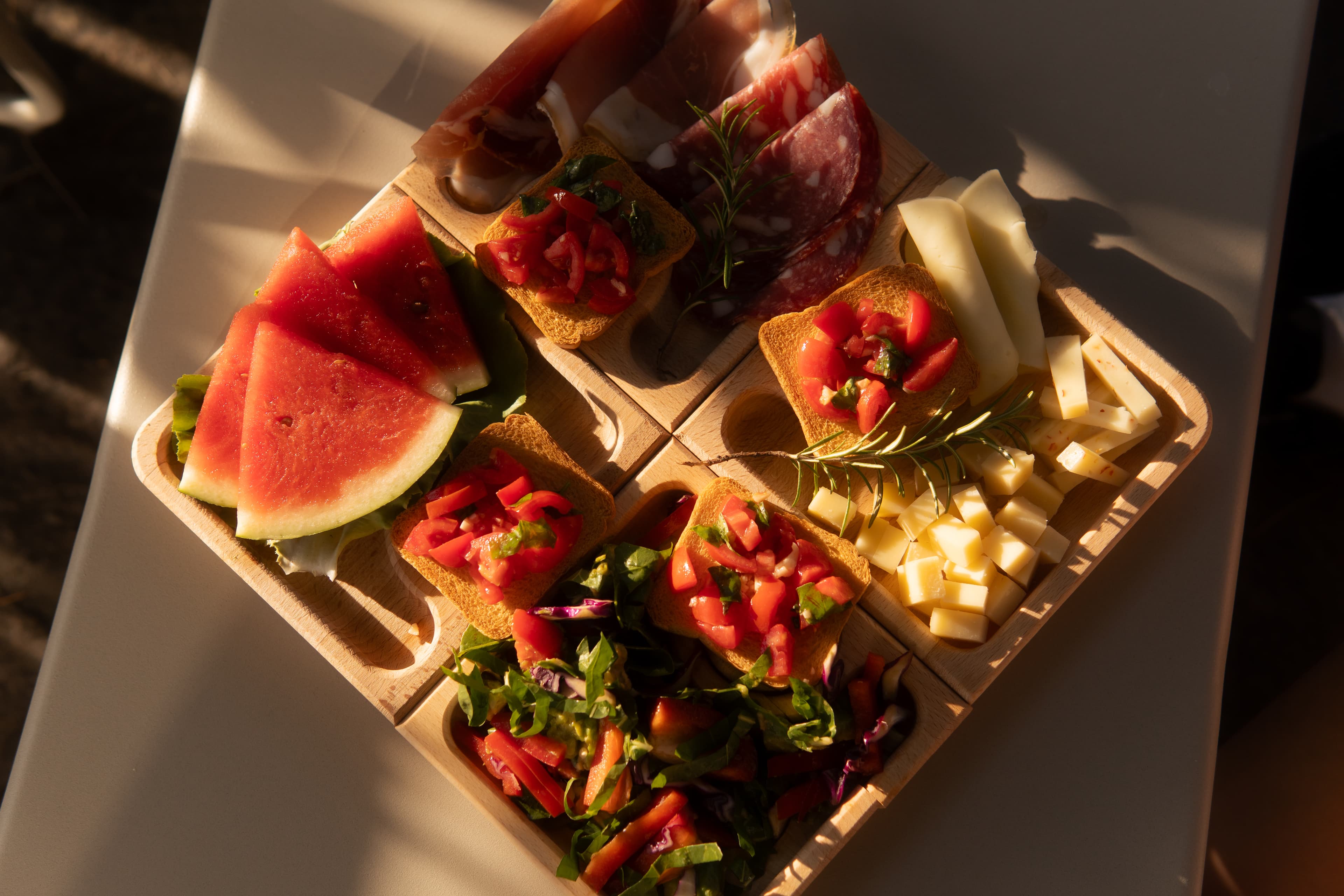 Farm-to-table Tuscan cuisine prepared with fresh ingredients from the garden including heirloom tomatoes, herbs, and olive oil
